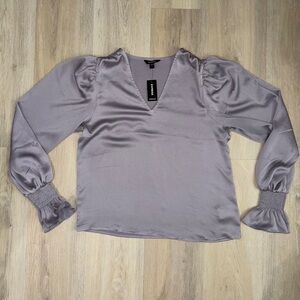 NWT! Express Long Sleeve Blouse with ruffle sleeves.Lavender. Size S.